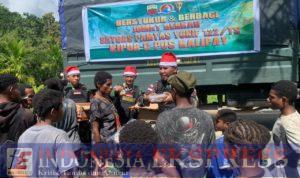 Semarak Sambut Hari Natal Penuh Bahagia, Satgas Yonif 122/TS Menjadi Santa Claus Berbagi Kasih di Perbatasan RI-PNG