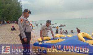 Personel Pamobvit Patroli di Pantai Toronipa, Ingatkan Pengunjung Agar Berhati-hati Saat Berenang