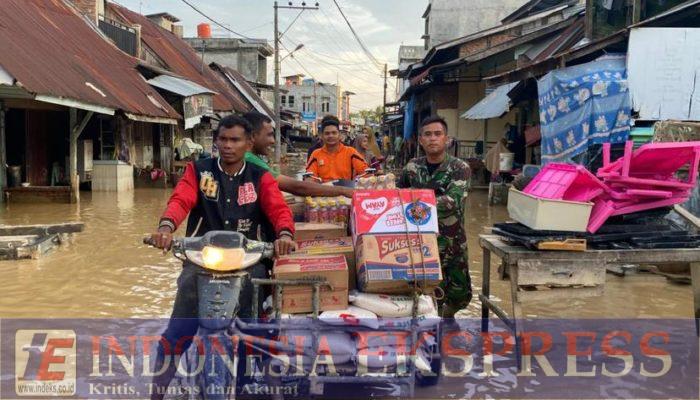Babinsa Distribusi Bantuan Kasad di Daerah terisolir Aceh Tamiang