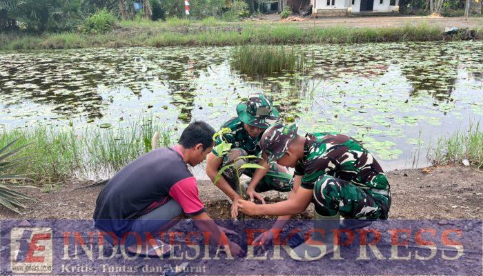 Peduli Lingkungan, Satgas TMMD ke-127 Bersama Warga Tanam Pohon di Bantaran Sungai Desa Wonosari
