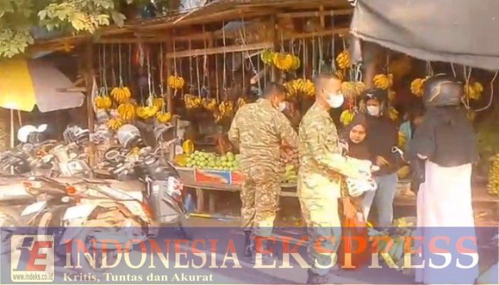 Cegah Dampak Asap Karhutla, Kodim 1403/Palopo Bagikan Ribuan Masker kepada Warga